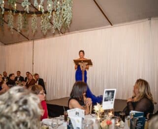 Lucy speaking at the Charity Ball.