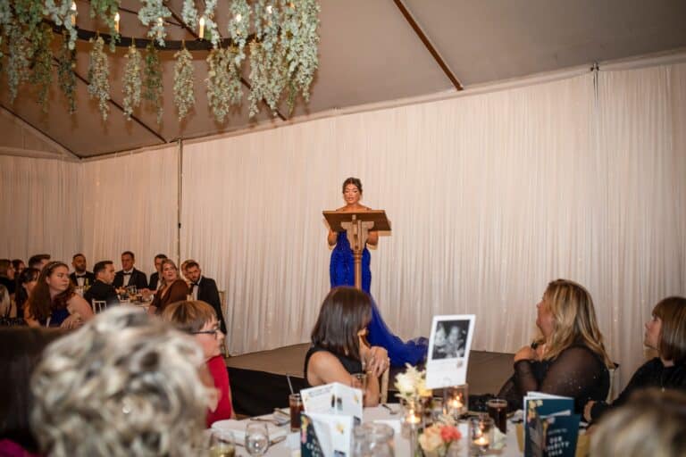 Lucy speaking at the Charity Ball.