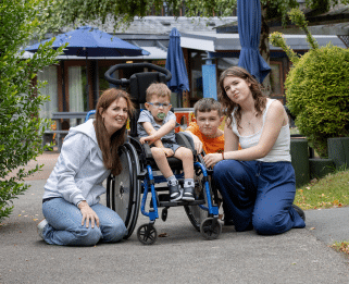 Axel and his family sat in the garden