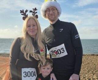Becky, Finley And Dom on Southend Seafront wearing Christmas fancy dress