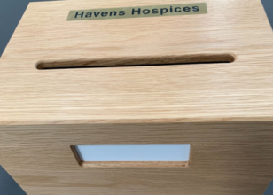 Oak box with the Havens Hospices name engraved