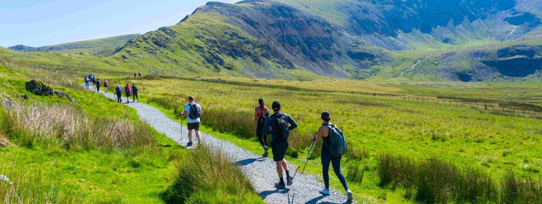 Hikers walking through the Welsh countryside