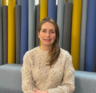 Kelly sat looking at the camera