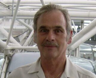 Brian Sears standing in a pod on the London Eye
